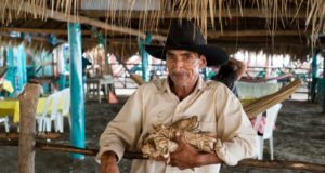 Minimum Wage Increase Cowboy in a Black Hat