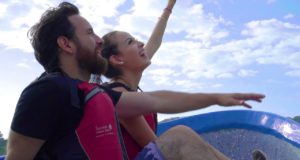 Solentiname Tours Discover Nicaragua Couple on Boat Pointing at Sky