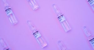 Sputnik Light VAccine Vials on Purple Background
