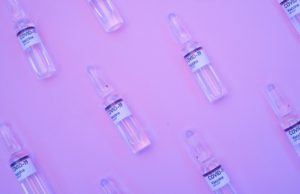 Sputnik Light VAccine Vials on Purple Background