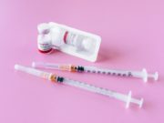 Voluntary Covid-19 Vaccination Program Covid 19 Syringes Pink Background