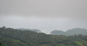 Rains Over Nicaragua Bahia Nacascolo Green Trees and Blue Water