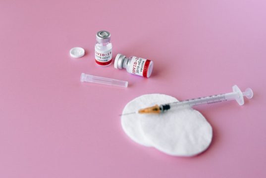 Covid-19 Vaccination Program Needle Swab Vials Pink Background
