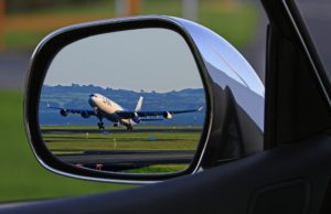 Covid-19 Insurance Exemptions Plane In Rear View Mirror