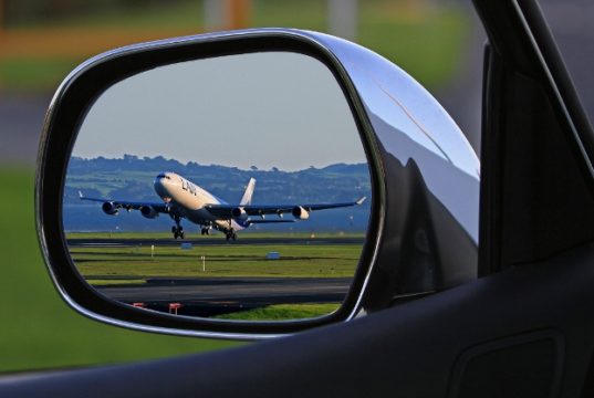 Covid-19 Insurance Exemptions Plane In Rear View Mirror