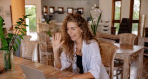 Digital Nomad Visa Woman At Table Working On Computer