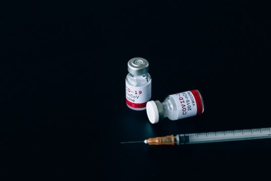 Doses of the Vaccine Vials and Syringe