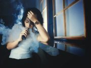 Vapors Female Using E Cigarette