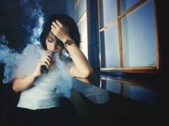 Vapors Female Using E Cigarette