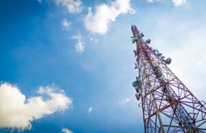 New Telecommunications Law Cell Phone Tower Blue Sky and Clouds