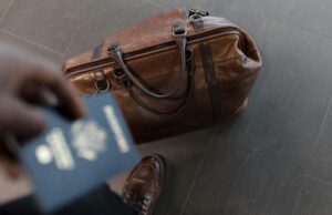 Immigration Hours Brown Leather Bag