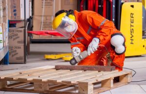 Minimum Wage 2026 Man With Safety Gear Using Grinder
